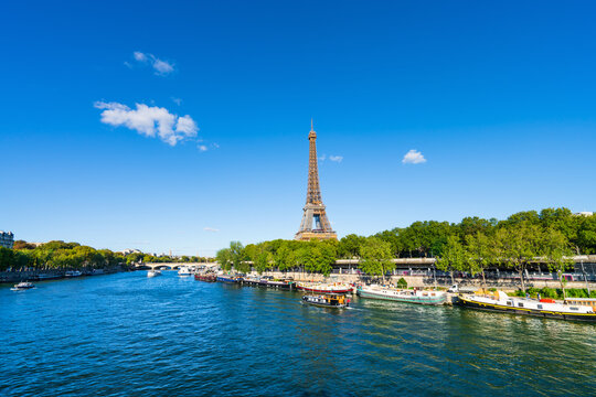 Eiffel Tower by seine river in Paris. France