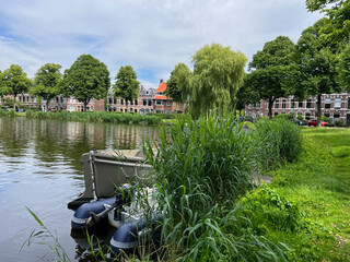 Fototapeta premium Beautiful view of canal with moored boats on sunny day