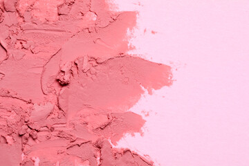 Smears of beautiful lipstick on pink background, top view. Space for text