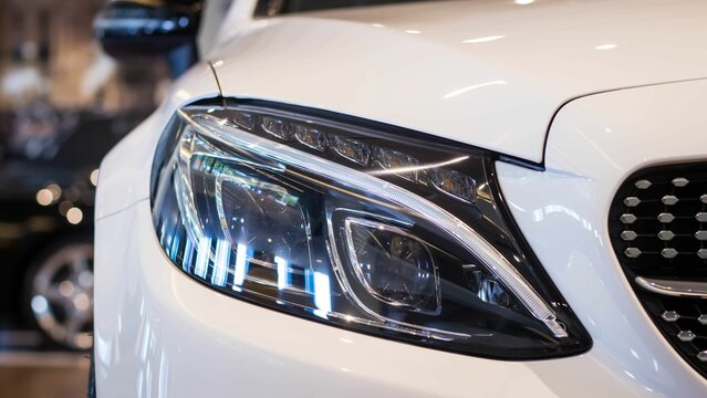 Closeup shot of details on a white Mercedes Benz AMG C43 car