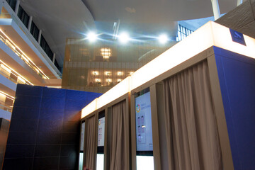 A booth for photographing documents in a government building.