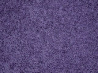 Purple wool fabric texture used as background. Empty purple fabric background of soft and smooth textile material. There is space for text.