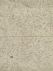 detail of the texture of a granite stone wall