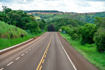 Fototapeta na wymiar asphalt road in Brazilian nature in South America. motion blur