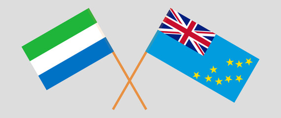 Crossed flags of Sierra Leone and Tuvalu. Official colors. Correct proportion