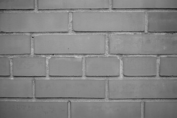 part of brick wall with seams, bw photo