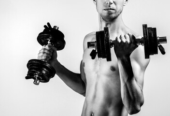 Fototapeta na wymiar A thin man in sports with dumbbells. Weak man lift a weight, dumbbells, biceps, muscle, fitness. Nerd maleraising a dumbbell. Black and white