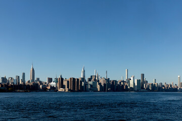 East River Manhattan skyline on a clear sunny day