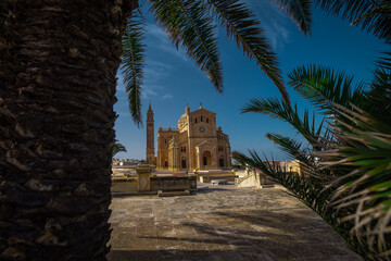 Overv iew of majestic and big Basilica of the National Shrine of the Blessed Virgin of Ta' Pinu on the island of Gozo, Malta on a sunny day.