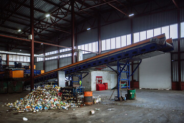 Modern waste processing plant. Sorting, pressing and packing of garbage