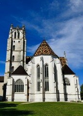 Fototapeta na wymiar Abside et clocher de l’église Saint-Nicolas-de-Tolentin du monastère royal de Brou à Bourg-en-Bresse