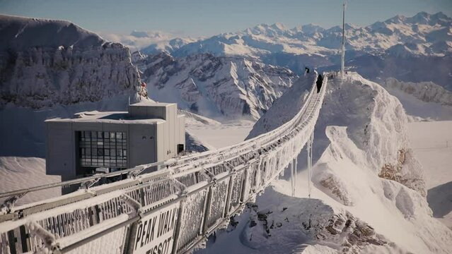 The Peak Walk on Sex Rouge on a beautiful sunny winter day. Glacier 3000 in December 2021