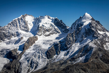 Fototapeta na wymiar Bernina and Palu mountain range with glaciers in the Alps, Engadine, Switzerland