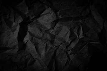 dark paper texture. minimalist and elegant crumple paper. simple dark background