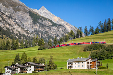 Red Train and Preda village in the Swiss Alps, Switzerland