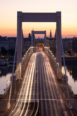 traffic on the bridge at sunrise in budapest