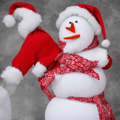 a snowman dressed like Santa Claus
