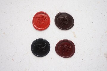pretty wax coins for a vintage look for wedding or invitation decoration