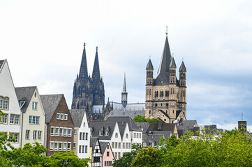 Obraz premium Cologne, Germany. Buildings in historic city centre. Cathedral and town hall. 