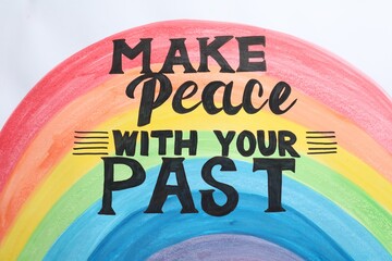 Painted rainbow and life-affirming phrase Make Peace With Your Past on white background