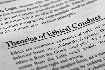 Fototapeta premium theories of ethical conduct written in business law and ethics book