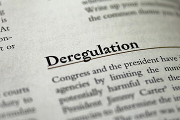 Fototapeta premium Deregulation word written in business law and ethics book