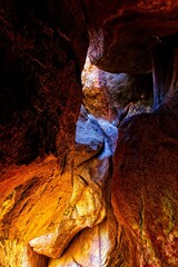 A dark, colorful and mysterious cave at Buffalo Park, Flagstaff, Arizona.