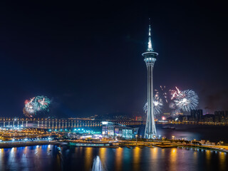 Night view of the fireworks over Macau Tower Convention and Entertainment Center