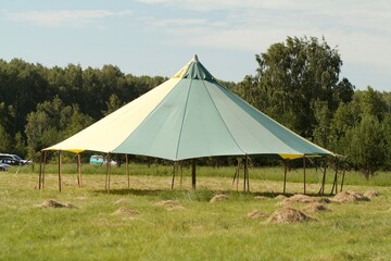 man and tent
puts up a tent in a field
tent in the forest
the girl puts up a tent building a house in the forest in a clearing