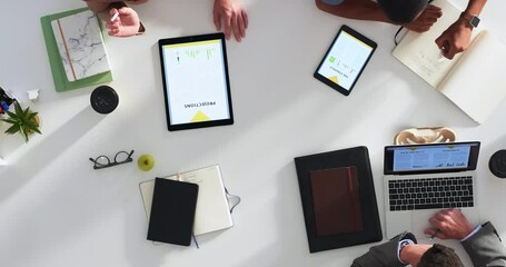 Table, speed and busy people planning digital marketing campaign with laptop notebook, sticky note and tablet tech. Brainstorming top view, business people collaboration and fast diversity teamwork - Powered by Adobe