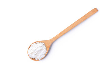 Calcium hydroxide powder (Dehydrated lime) in wooden spoon isolated on white background. Top view....