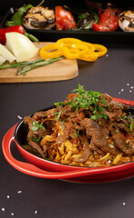 Turkish food lamb meat saute, sac kavurma with and french fries