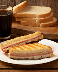 Traditional toasted bread stuffed with mortadella and cheese.