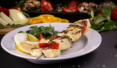 Grilled fish kebab skewers