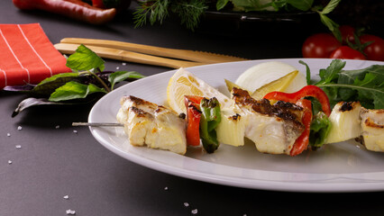 Grilled fish kebab skewers