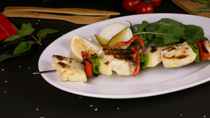 Grilled fish kebab skewers