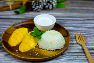 Mango sticky rice topping mint and sesame is My snack summer range is sweets to help cool down very well has the sweetness of mango and creamy of sticky rice with coconut milk fresh.