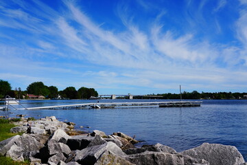 Landscape view of the waters of Sturgeon Bay, Wisconsin flooding onto the shore line of Sturgeon Bay.