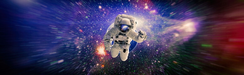 Working for space station in outer space . Cosmic art, science fiction wallpaper. Elements of this...