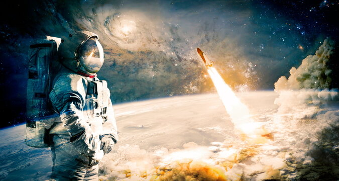Astronaut spaceman working for space station in outer space .Elements of this image furnished by NASA space astronaut photos.