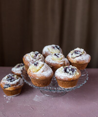 Sweet pastries on the table. Buns with berries and custard.