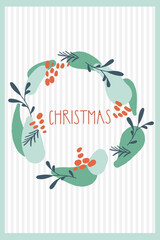 Christmas and New Year greeting card with wreath and hand written Christmas text