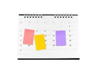 three colourful sticky notes on cardboard desk calendar page with date isolated on transparent, monthly business deadline planning or event reminder schedule