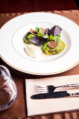 Stuffed pearl barley rolls stuffed with cabbage and truffle