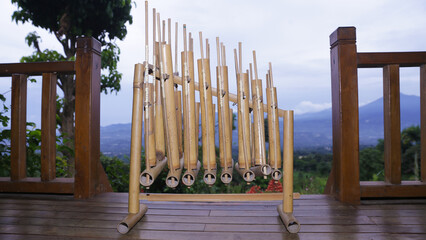 Angklung, the traditional sundanese musical instrument made from bamboo . angklung from sunda west java, indonesia. Isolated on black background