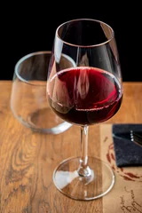 Fotobehang red wine on the table © Maksim Shebeko