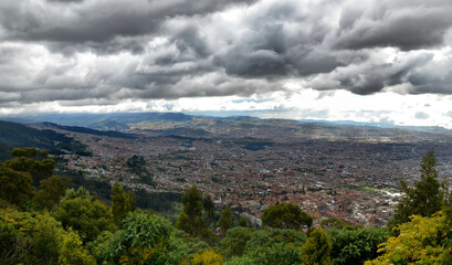 Fototapeta na wymiar colombian cloudy cityscape view from the mountains 