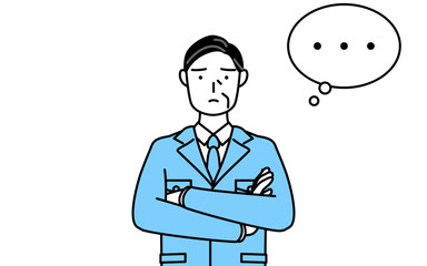 腕を組んで考える作業着を着た男性（経営者、管理職、工場長）