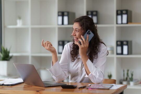 Business woman talking phone at office space. real estate, lawyer, non-profit, marketing