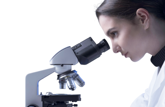 Woman using a microscope in the lab